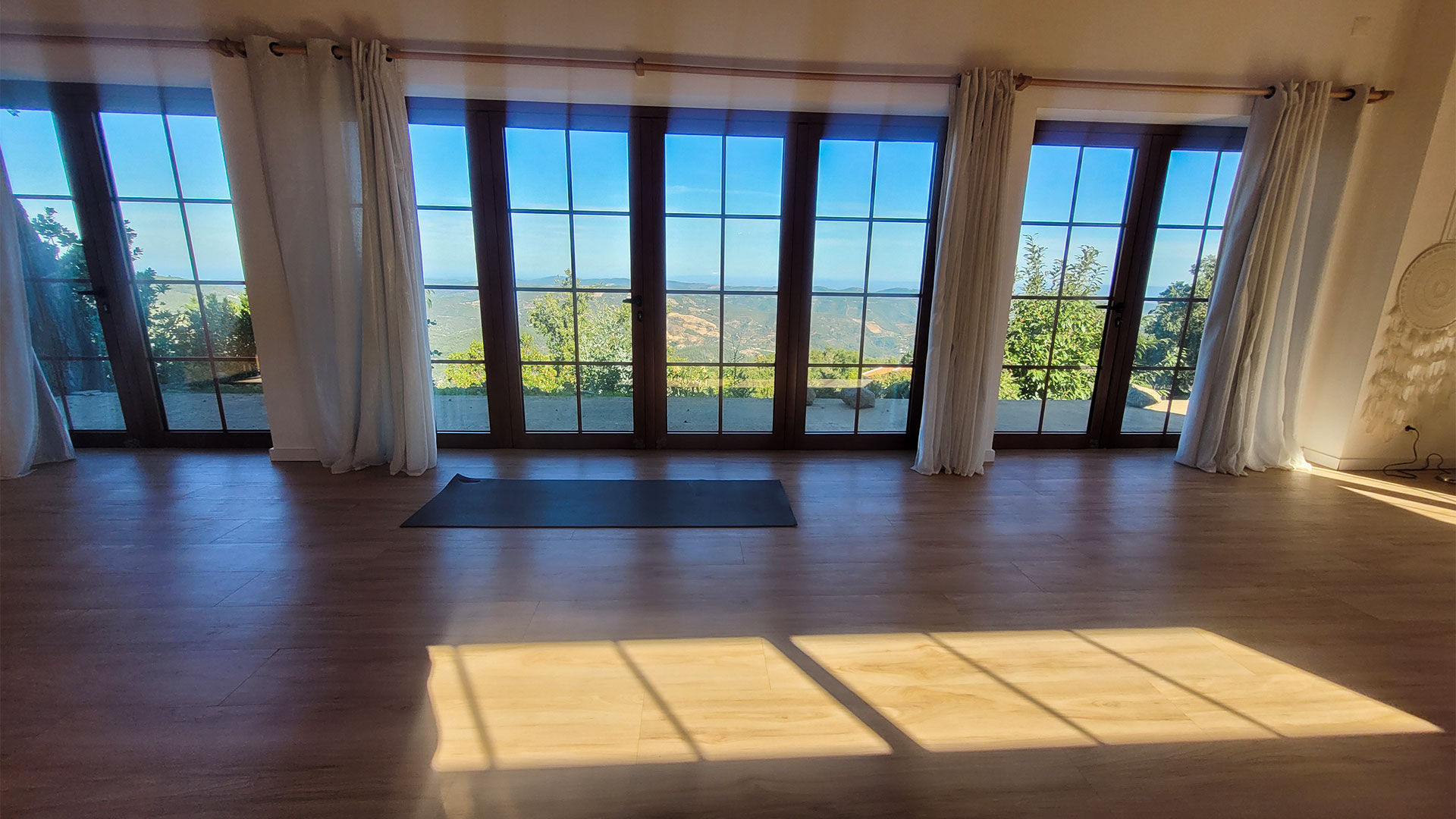 Yoga studio at Bodhi Bhavan with views over the Algarve hills